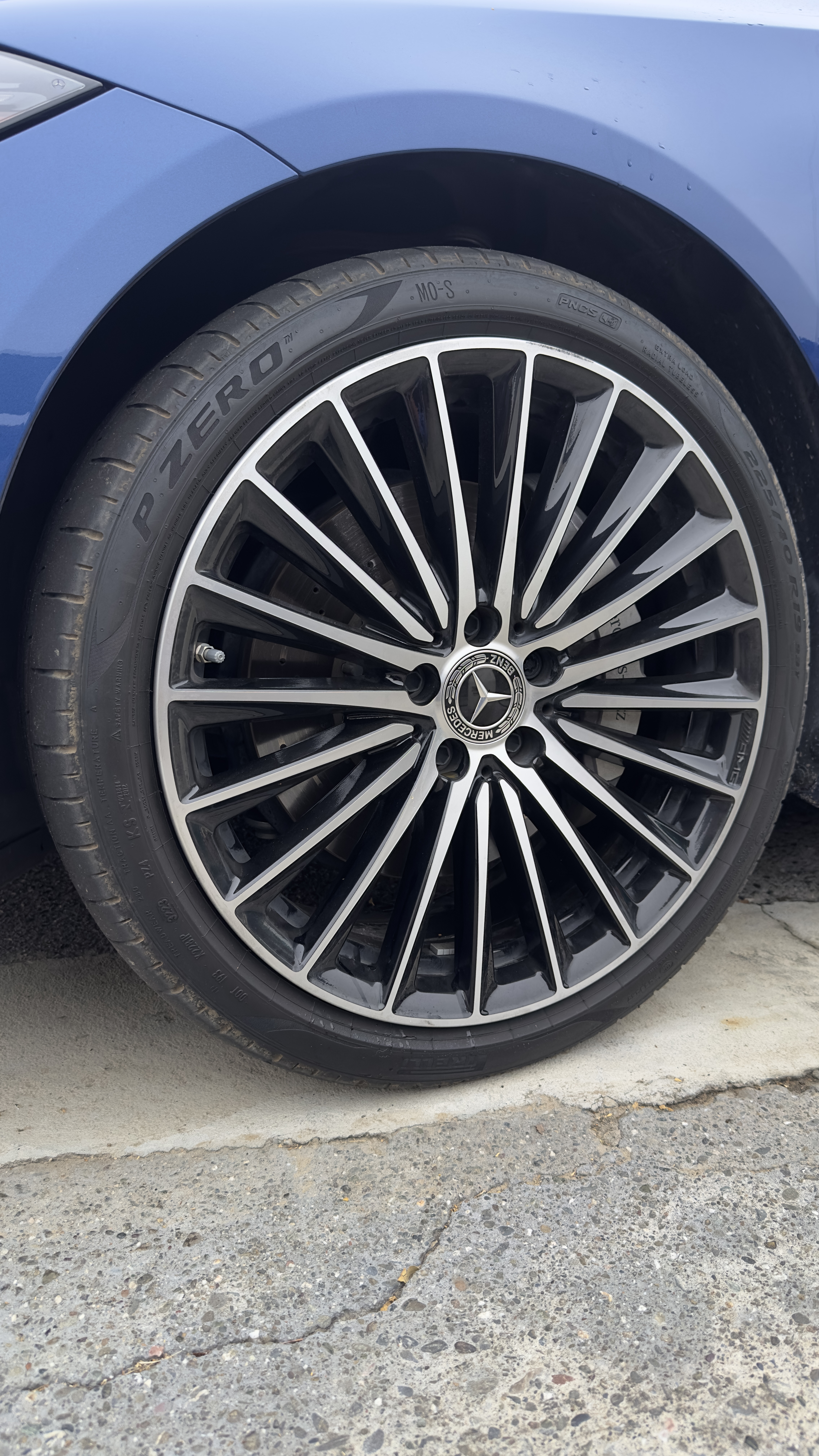 Luxury Mercedes multi-spoke wheel, dulled and scuffed — before detailing